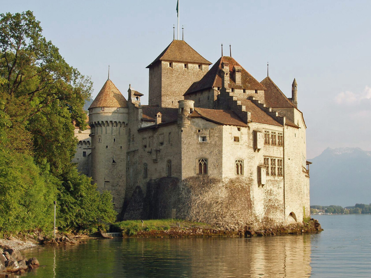 Chillon Castle sits on the edge of Lake Geneva