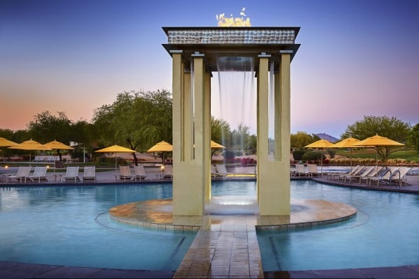 With the grand Wildfire water feature in the center acting as your beacon to the main pool complex, you can swim and enjoy views of Wildfire Golf Course's emerald fairways and Scottsdale's statuesque mountains. Photo by Werner Segarra courtesy of JW Marriott Phoenix Desert Ridge Resort & Spa