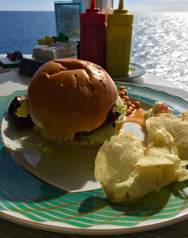 luxury cruise on Regent Seven Seas - Burgers with a view at the Pool Grill, a favorite for lunch. Photo by Catherine Parker