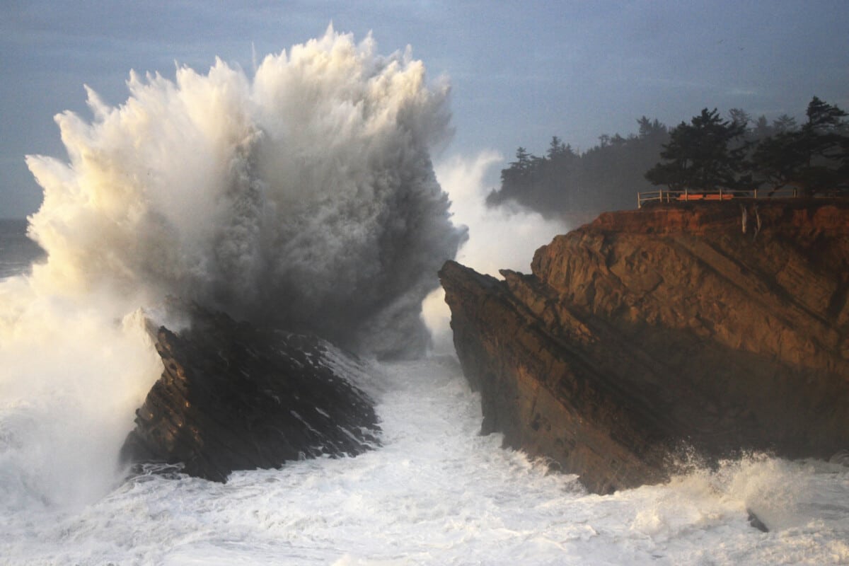 Watching dramatic waves break at Shore Acres Stat Park is an exhilarating thing to do at Coos Bay.