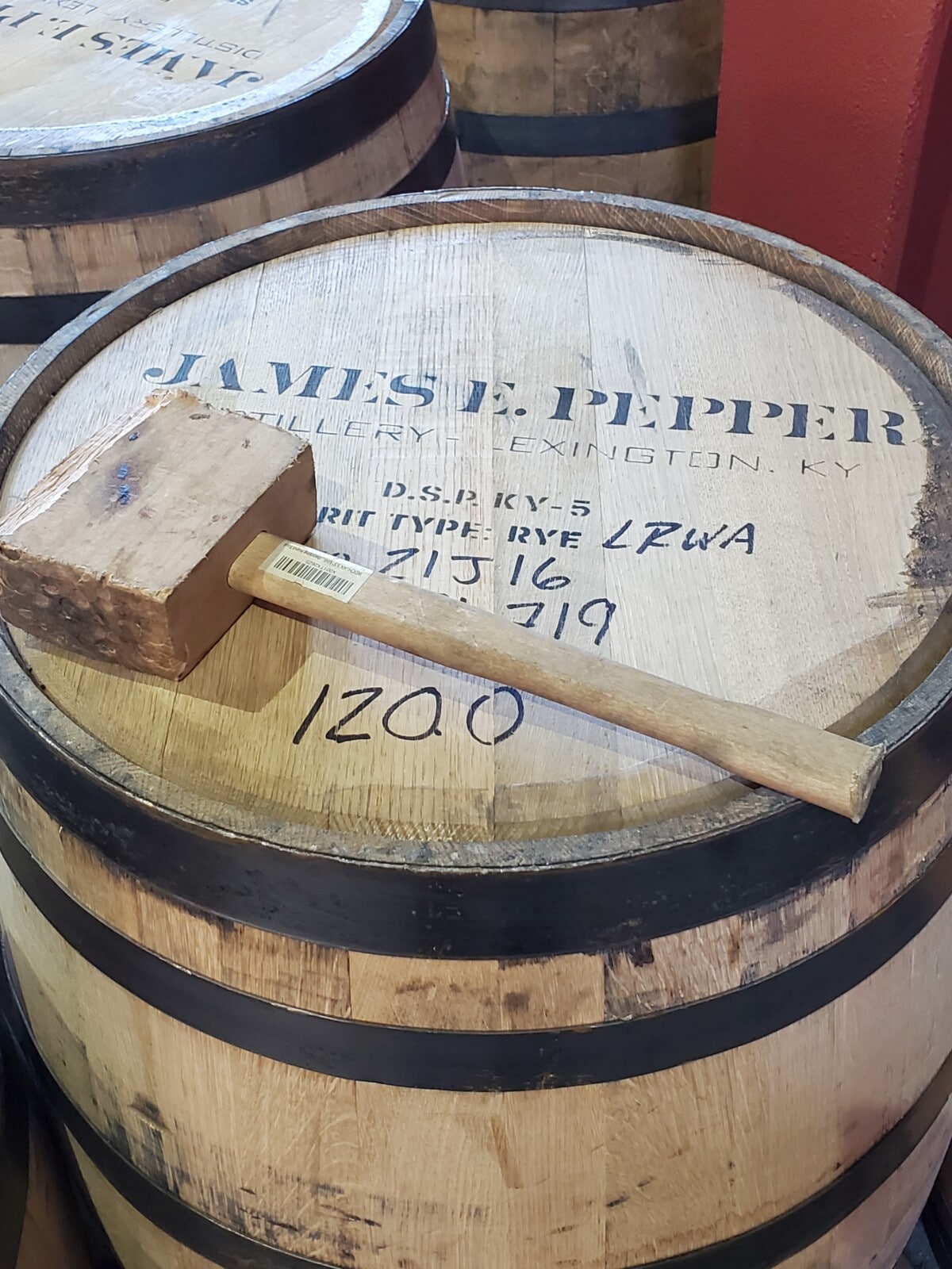 Whiskey barrel and mallet