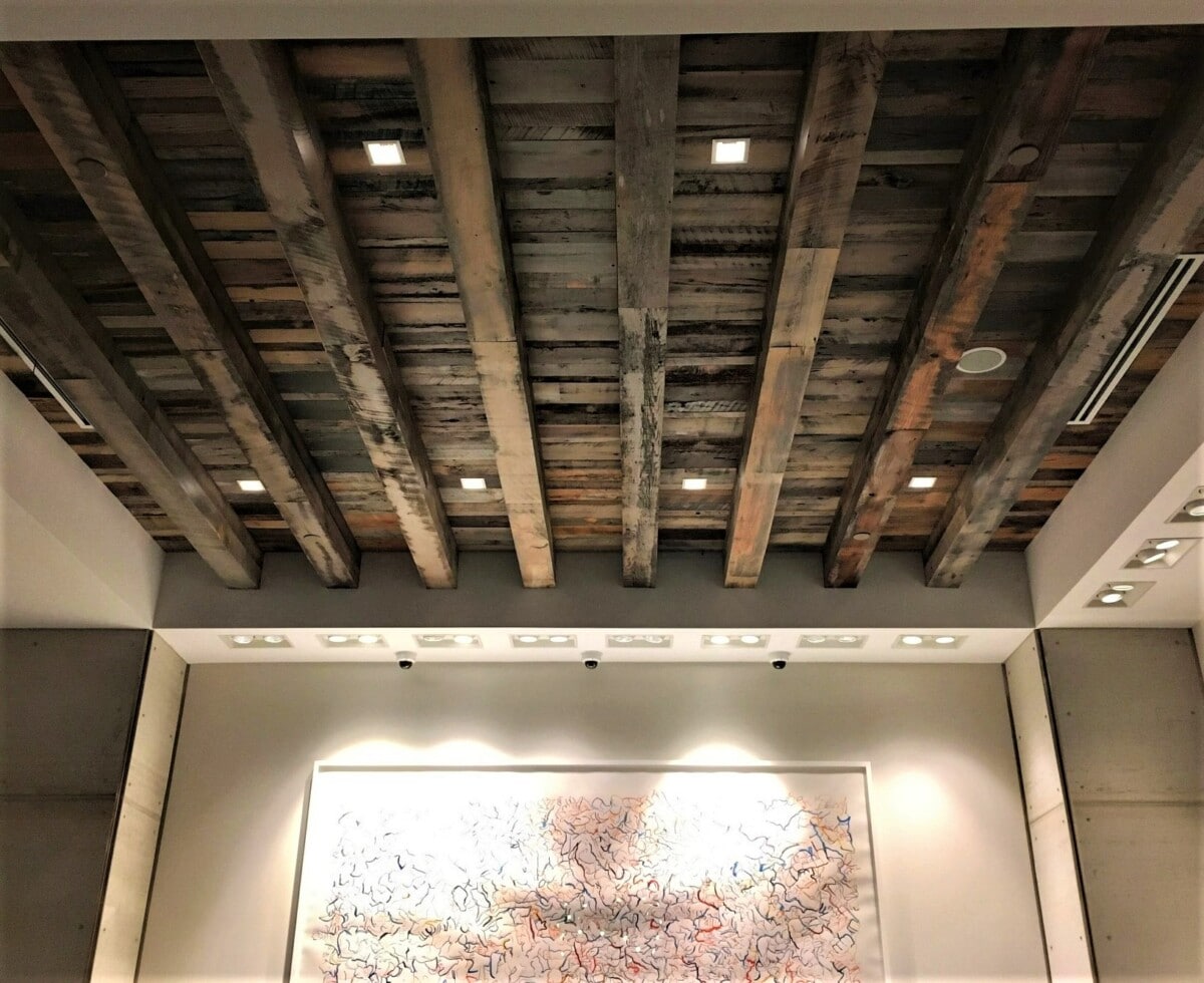 Raw wood beams in the lobby of the Kimpton Aertson Hotel
