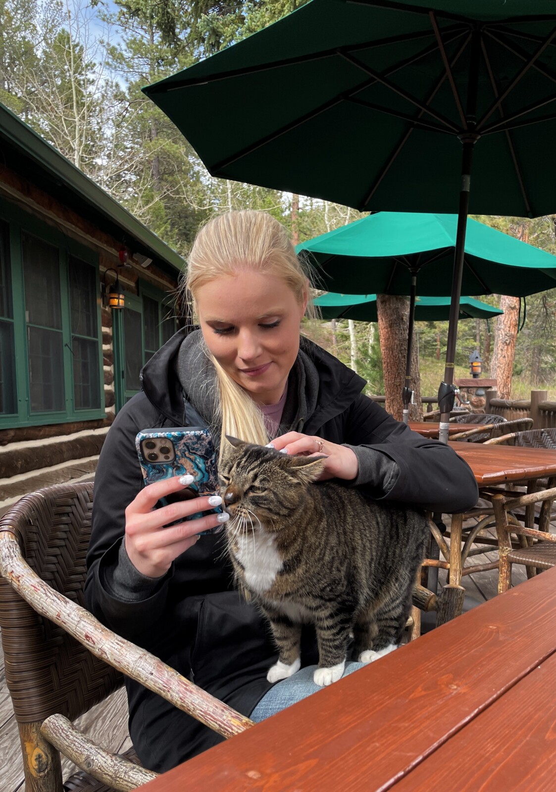 Guest and cat at The Ranch at Emerald Valley