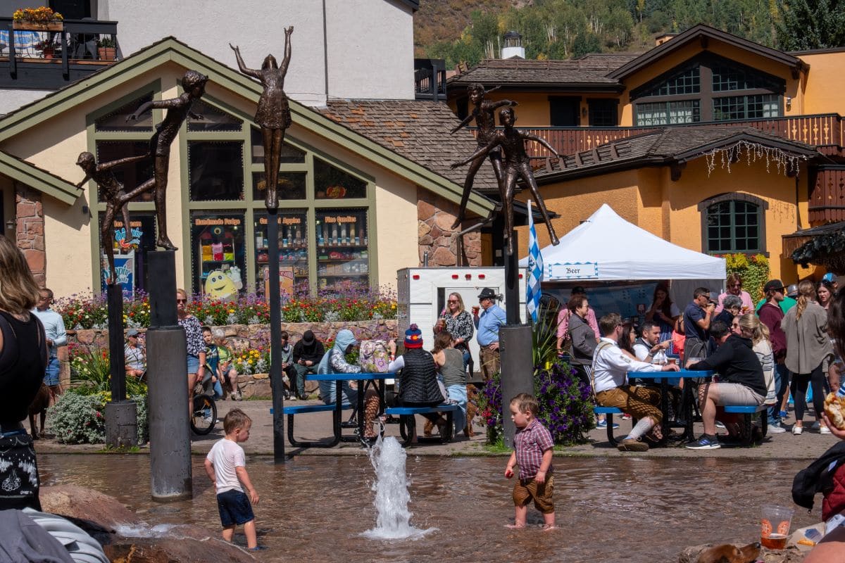 Kids playing in Vail Village. Fall in the Colorado Rockies.