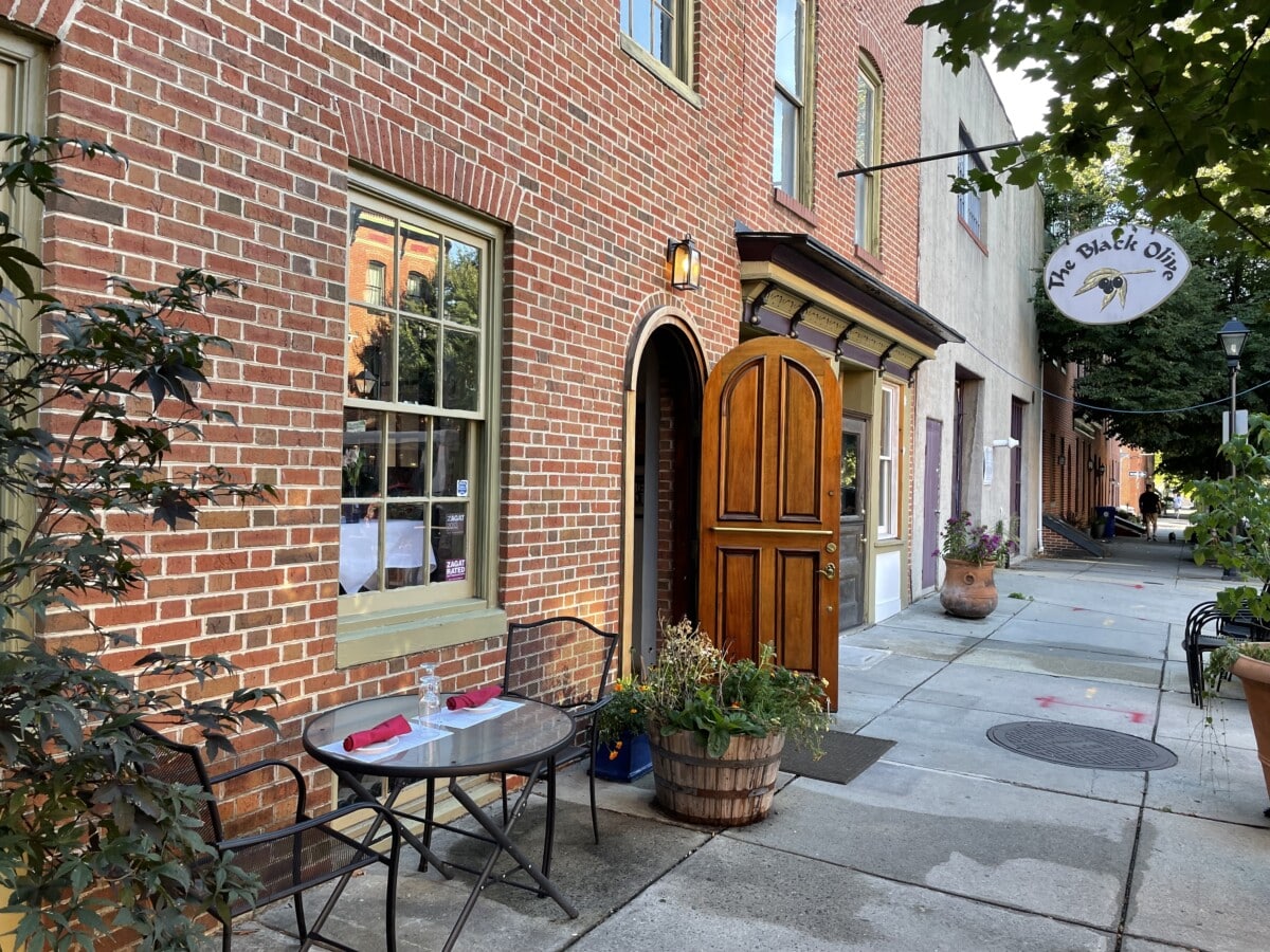 The Black Olive has outdoor seating in a historic Baltimore Neighborhood.