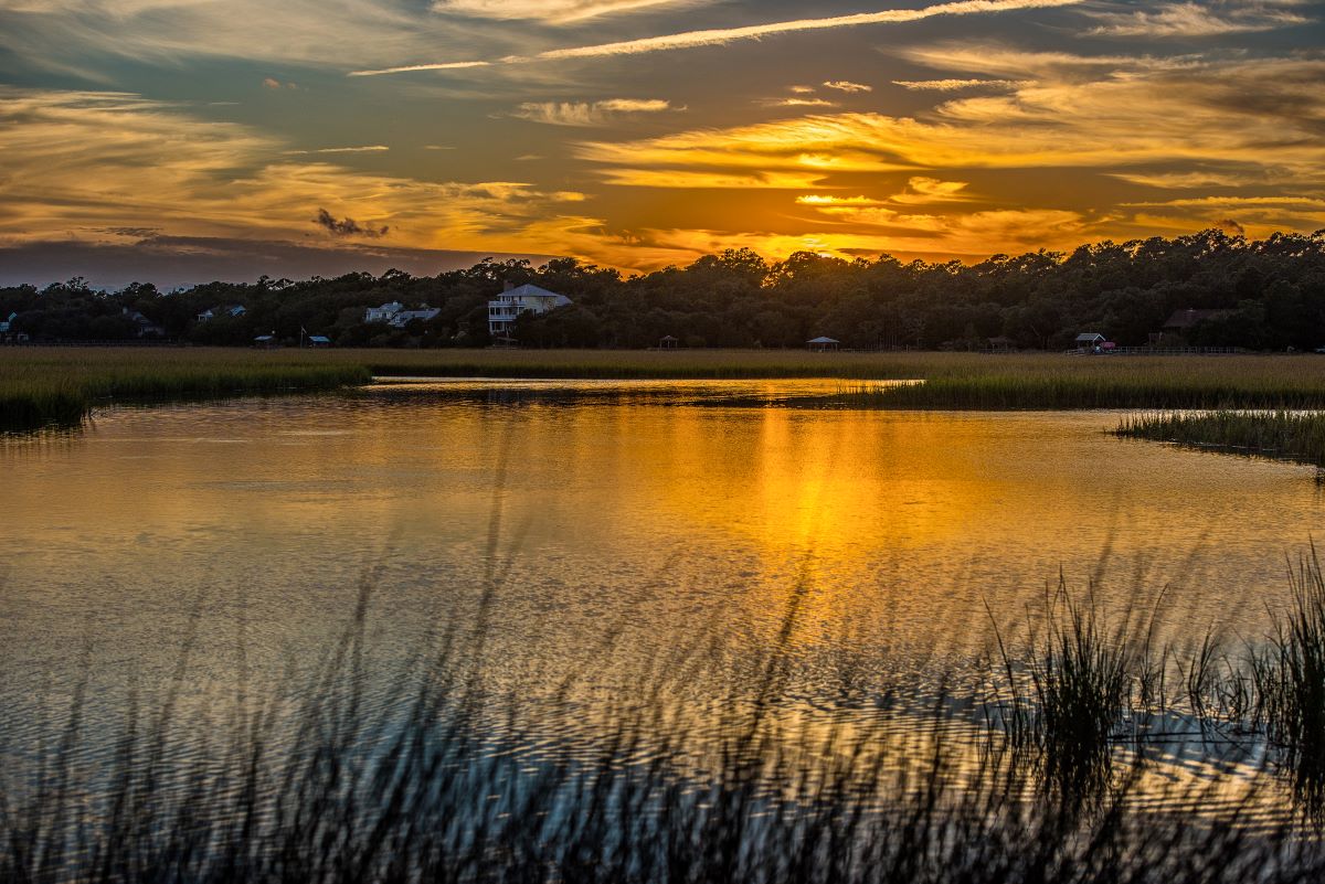 A sunset over marshes while on a romantic winter weekend In Myrtle Beach.
