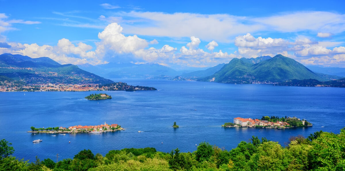 Panoramic view of Lago Maggiore lake, three Borromean islands (Isola Bella, Superiore, Madre) and Alps mountains, Italy, Switzerland