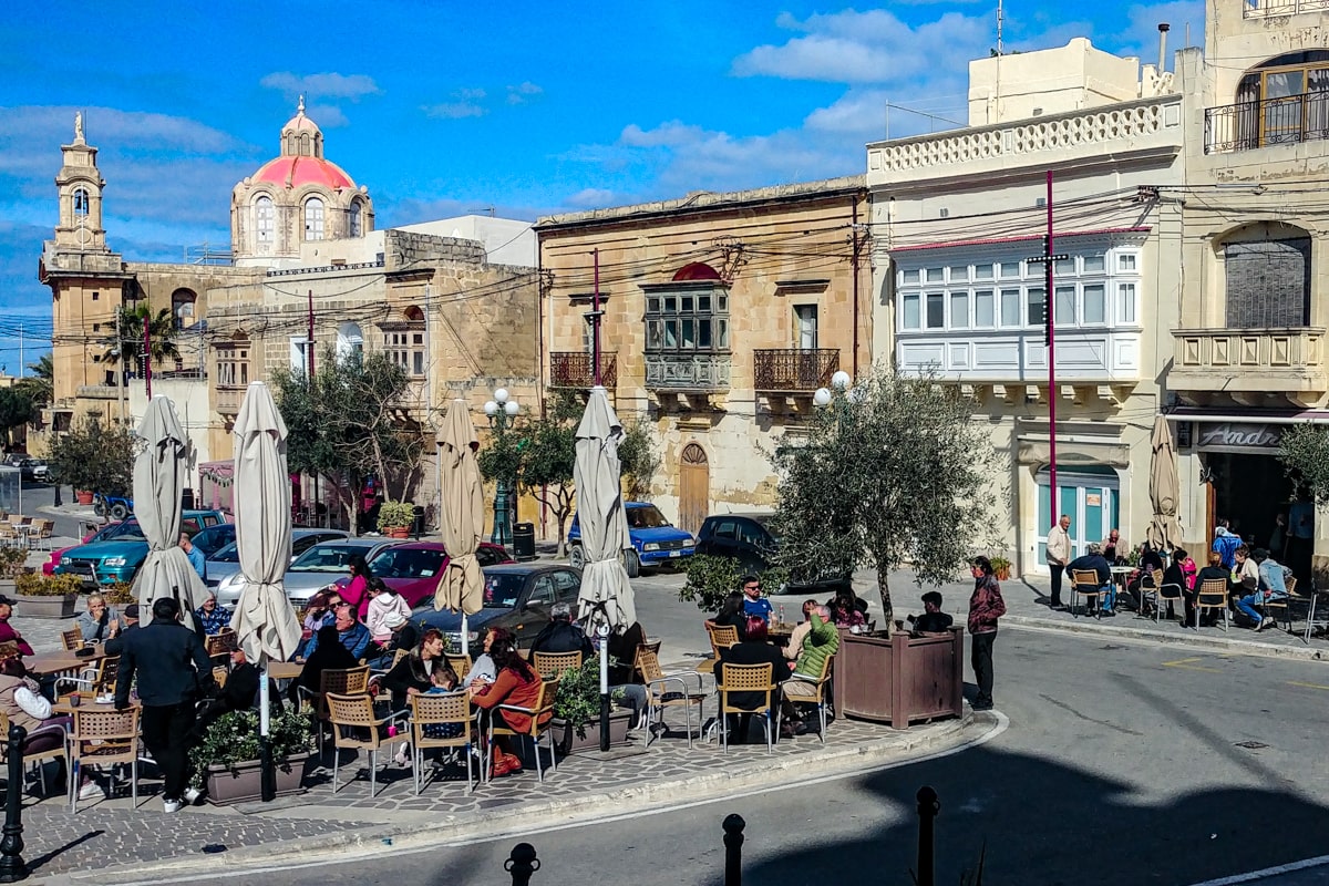 Andria’s on the Nadur village square, where locals and visitors gather for coffee, wine, and pastries, only a day trip from Malta.