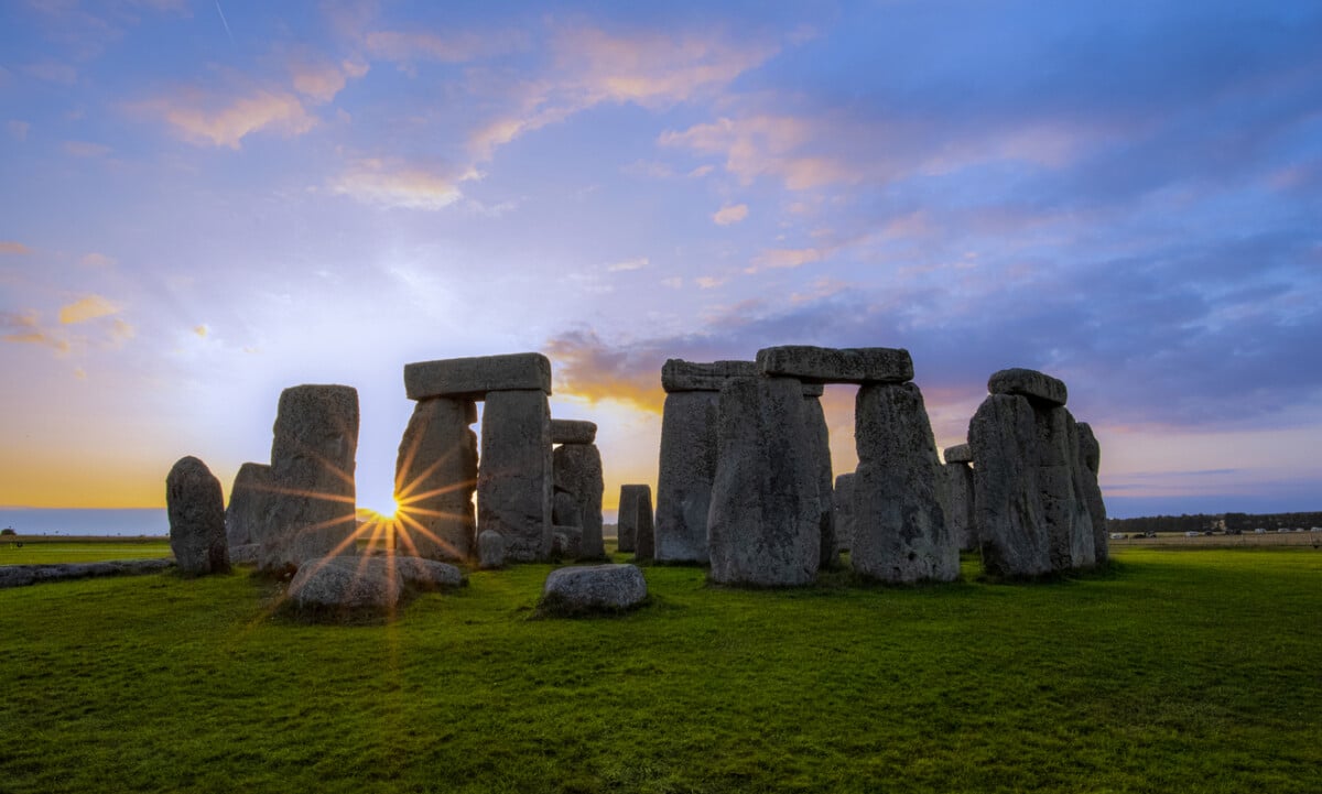 Sunset behind Stonehenge. Photo by Mark Devereux via iStock by Getty Images