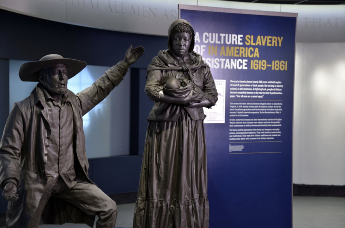 National Civil Rights Museum: Slave trader selling a woman and her baby