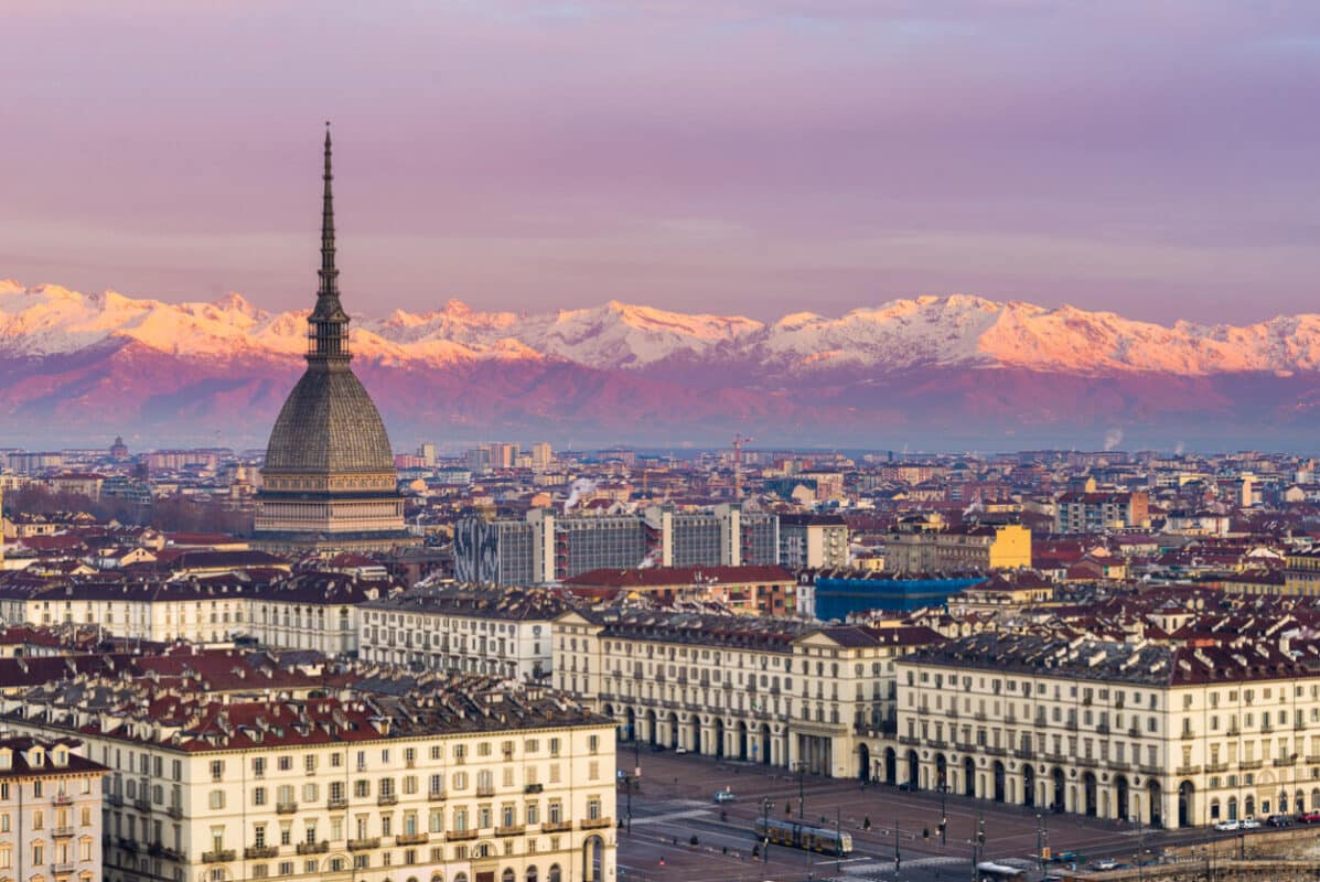 Torino (Turin, Italy) at sunrise with the Mole Antonelliana towering over the city. Photo by Fabio Lamanna via iStock by Getty Images