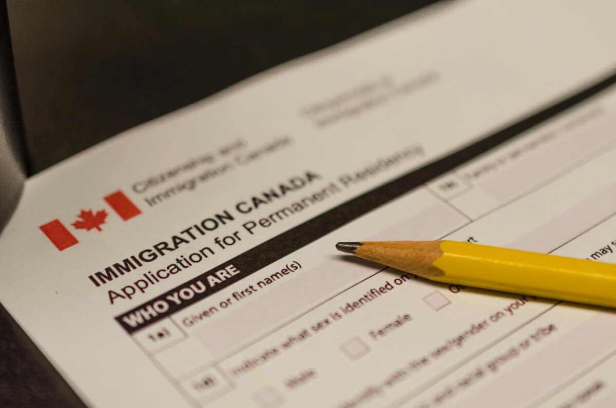 A fake Canada immigration application form kept with pencil