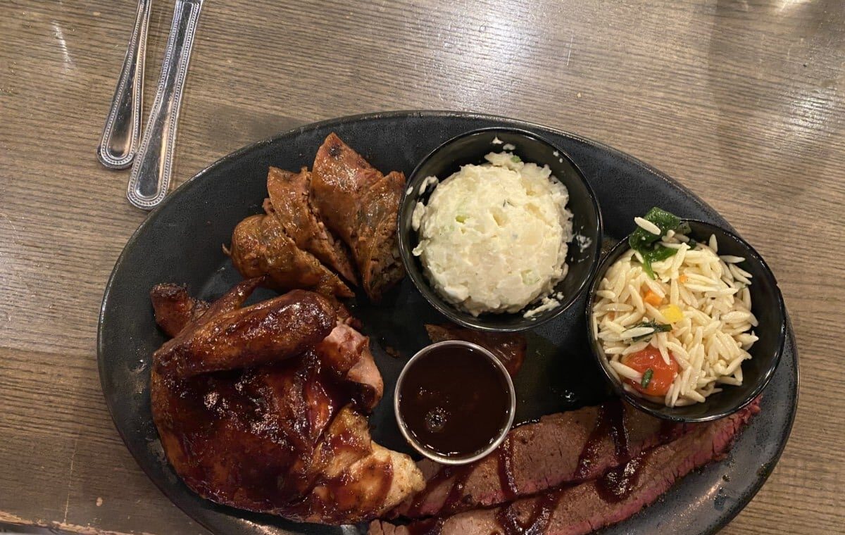 BBQ brisket and chicken with sides in Kansas City.
