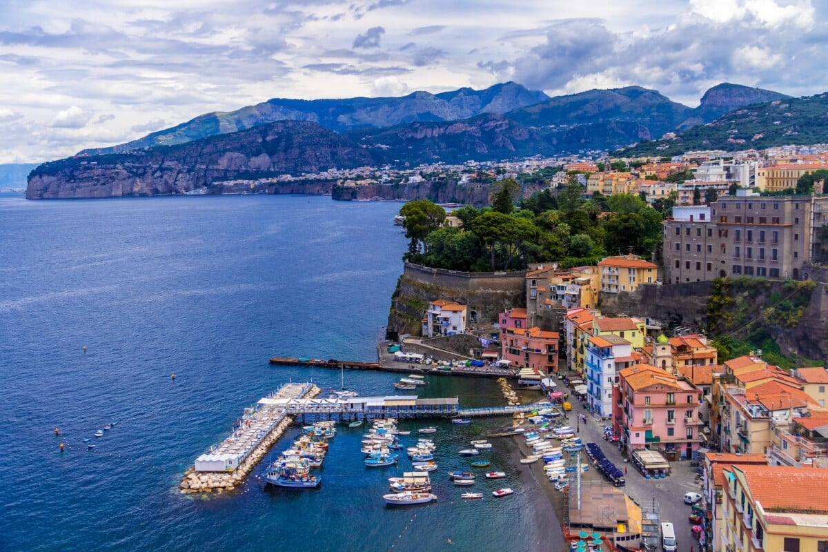 Sorrento, Italy. Photo by <a href="https://unsplash.com/@jannerboy62?utm_content=creditCopyText&utm_medium=referral&utm_source=unsplash">Nick Fewings</a> on <a href="https://unsplash.com/photos/aerial-view-of-city-buildings-near-body-of-water-during-daytime-a61Cp6eFkPg?utm_content=creditCopyText&utm_medium=referral&utm_source=unsplash">Unsplash</a>