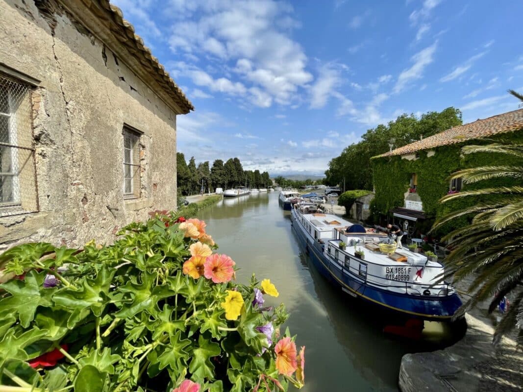 Enchanté with European Waterways docked in Le Somail on Canal du Midi